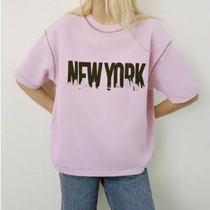 Pink Zara short sleeved sweatshirt with New York skyline